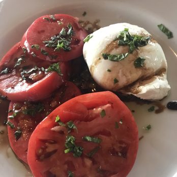 Yellow Dog Cafe - Burrata with home grown tomatoes - Seafood Near Me - Malabar, Florida Yellow Dog Cafe - Burrata with home grown tomatoes - Seafood Near Me - Malabar, Florida
