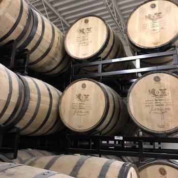 Murray Hill Club - barrels stacked on a rack - Cocktail Bars Near Me - Washington, DC, District of Columbia