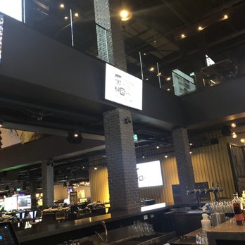 The Rec Room - TVS around the bar - Canadian (New) Near Me - Calgary, Alberta
