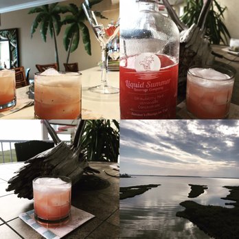 Liquid Summer Beverage Co - a bottle of liquid and two glasses of water - Juice Bars & Smoothies Near Me - Denver, Colorado
