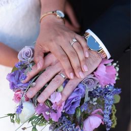Engagement ring, wedding bands.