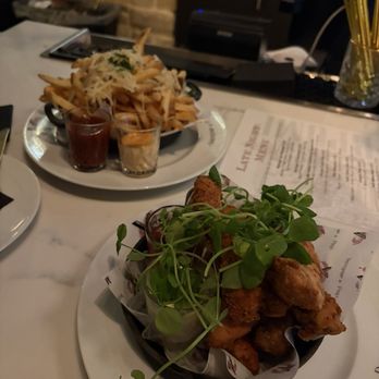Vanderpump A Paris - Late night menu - Gruyère fries & the chicken tenders - highly recommend and large enough to share! - French Near Me - Las Vegas, Nevada Vanderpump A Paris - Late night menu - Gruyère fries & the chicken tenders - highly recommend and large enough to share! - French Near Me - Las Vegas, Nevada