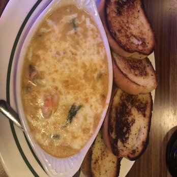 Orleans Seafood Kitchen - See food dipping - Cajun/Creole Near Me - Katy, Texas