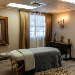 LNO Boutique - Our cozy massage room offers a peaceful, relaxing environment with soft lighting and soothing music--perfect for stress relief.