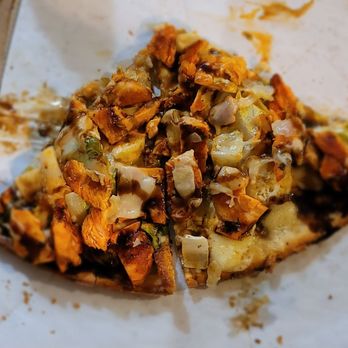 Dino's Pizzeria - a half eaten pizza - Pizza Near Me - Thornwood, New York Dino's Pizzeria - a half eaten pizza - Pizza Near Me - Thornwood, New York
