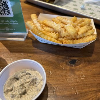 Shake Shack Ladue Crossing - Black Truffle Sauce with the Parmesan Fries - Burgers Near Me - Saint Louis, Missouri Shake Shack Ladue Crossing - Black Truffle Sauce with the Parmesan Fries - Burgers Near Me - Saint Louis, Missouri