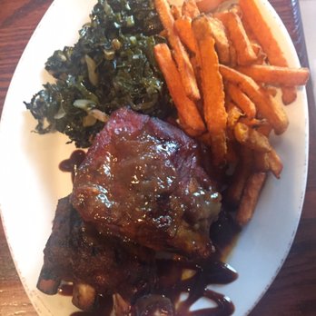 Rocky River Tap and Table - Ribs with greens and sweet potato fries - Bars Near Me - Granger, Indiana