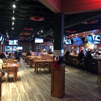 WingHouse Bar & Grill - Seating area - Sports Bars Near Me - Kissimmee, Florida WingHouse Bar & Grill - Seating area - Sports Bars Near Me - Kissimmee, Florida