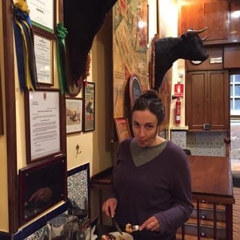 Los Vitorinos - The wife digging into some tapas at Taverna Los Vitorinos - Tapas Bars Near Me - Zaragoza, Z