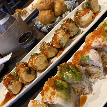 Kigawa Bistro - The Snow king & fried Salmon roll. In the back you have the bacon shrimp. - Sushi Bars Near Me - San Leandro, California Kigawa Bistro - The Snow king & fried Salmon roll. In the back you have the bacon shrimp. - Sushi Bars Near Me - San Leandro, California