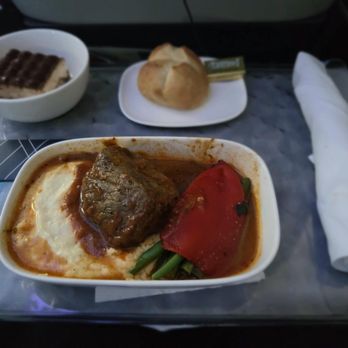 Delta Air Lines - May 24: A surprisingly tasty meal on DL 419. The beef was tender and tasty, the roll warm, the Tiramisu (pretty good). - Airlines Near Me - Las Vegas, Nevada
