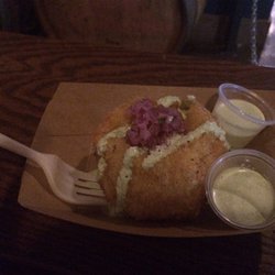 PAPA LLAMA - The aji panca chicken papa rellena with red onion and cilantro sauce. So good. Bigger than I expected.