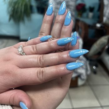Lanie’s Nails - Full set acrylic short stiletto shape color sky blue gel with glitter - Nail Salons Near Me - San Diego, California Lanie’s Nails - Full set acrylic short stiletto shape color sky blue gel with glitter - Nail Salons Near Me - San Diego, California