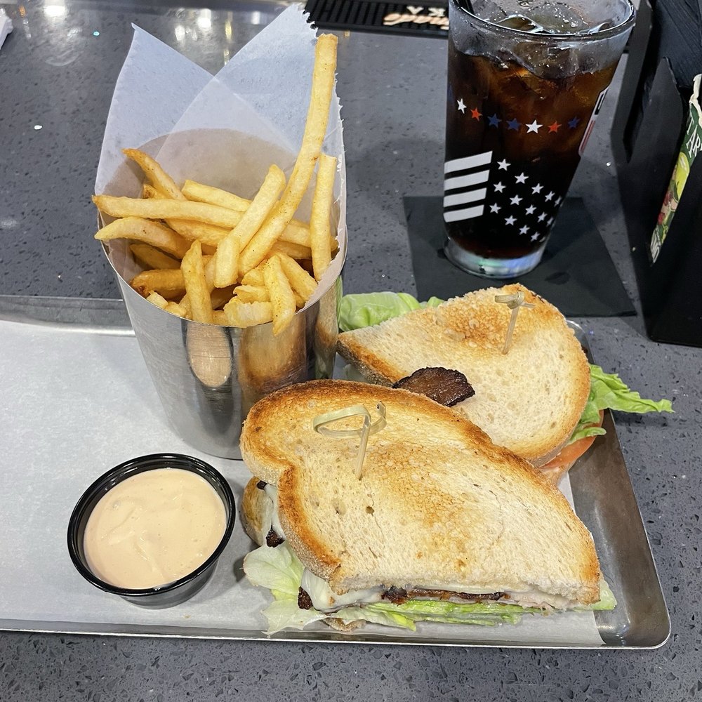 Spectators Bar & Grill - Turkey's melt - Sports Bars Near Me - Richmond, Texas Spectators Bar & Grill - Turkey's melt - Sports Bars Near Me - Richmond, Texas