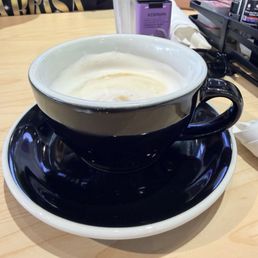 Latte, served in a small cup. $4 Latte, served in a small cup. $4