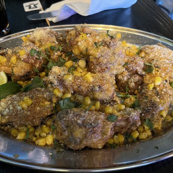 Sacred Cow Tavern - Cajun Elote Chicken Wings - Pubs Near Me - Cedar Rapids, Iowa