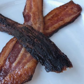 Hash Kitchen - Raw/burned bacon served with my breakfast. - Breakfast & Brunch Near Me - Scottsdale, Arizona
