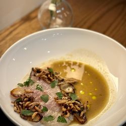 Giusto Newport - Black bass crudo: aguachile negro, onion .