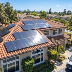 Top Down Gutter & Windows - A residential home with their gutters, solar panels and windows cleaned.