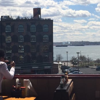Brooklyn Crab - The birthday girl taking a pic of the great view! - Seafood Near Me - Brooklyn, New York