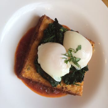 Duo Restaurant - Zippy cake with a tomato caper sauce, spinach, and poached eggs. - New American Near Me - Denver, Colorado Duo Restaurant - Zippy cake with a tomato caper sauce, spinach, and poached eggs. - New American Near Me - Denver, Colorado