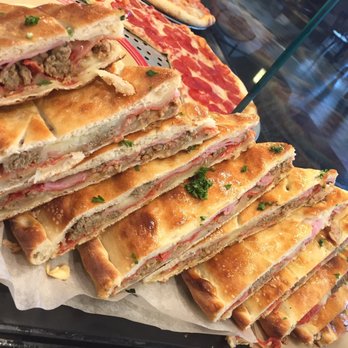 Villa Fresh Italian Kitchen - a stack of sandwiches - Pizza Near Me - Mentor, Ohio Villa Fresh Italian Kitchen - a stack of sandwiches - Pizza Near Me - Mentor, Ohio