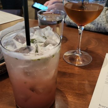 Noa Minneapolis - Tiki cocktail in the front, mezcal cocktail in the back - Cocktail Bars Near Me - Minneapolis, Minnesota Noa Minneapolis - Tiki cocktail in the front, mezcal cocktail in the back - Cocktail Bars Near Me - Minneapolis, Minnesota