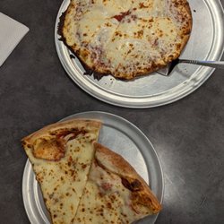 Long Island Pizza - Two slices, and a gluten free cheese pizza (we ordered the GF "well done" because we like a crispy crust)