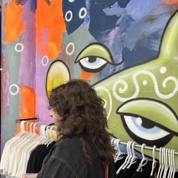Seattle Waterfront Marketplace - Art wall and clothes - Public Markets Near Me - Seattle, Washington Seattle Waterfront Marketplace - Art wall and clothes - Public Markets Near Me - Seattle, Washington