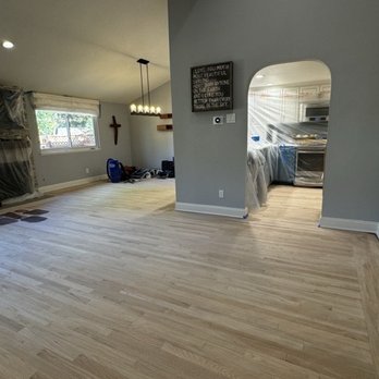 Artisan Wood Floors - Stripped of 15 years of cheap floor polish, sun faded areas, and dings and dents and prepped for staining. - Flooring Near Me - San Leandro, California Artisan Wood Floors - Stripped of 15 years of cheap floor polish, sun faded areas, and dings and dents and prepped for staining. - Flooring Near Me - San Leandro, California