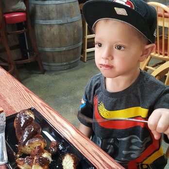 Crust & Crumb - Enjoying their chocolate donut - Pizza Near Me - Turlock, California