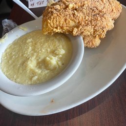 Crispy Flounder Fillets over Cheese Grits Crispy Flounder Fillets over Cheese Grits