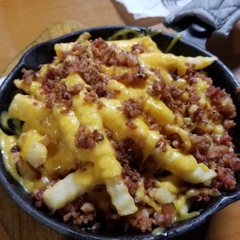 Windy City Pizza - Loaded Fries A heaping mound of fries topped with real bacon, sour cream, and melted cheddar - Pizza Near Me - Virginia Beach, Virginia Windy City Pizza - Loaded Fries A heaping mound of fries topped with real bacon, sour cream, and melted cheddar - Pizza Near Me - Virginia Beach, Virginia