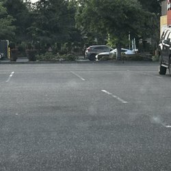 Wendy's - Photo of workers at 6:25 in the morning outside smoking and talking on the phone instead of preparing to open at 6:30.