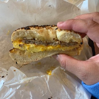 The Bagel Bakery - Onion bagel, Sausage omelet-on-a-bagel. - Coffee & Tea Near Me - Monterey, California The Bagel Bakery - Onion bagel, Sausage omelet-on-a-bagel. - Coffee & Tea Near Me - Monterey, California