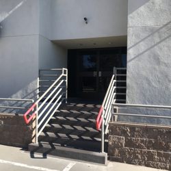 The Healing Project Physical Therapy - The front entrance of the building from
the upper lot.  There are six small steps.