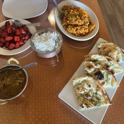 Lamb curry, chili chicken, chicken biryani and garlic naan bread!