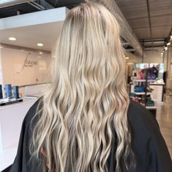 Blonde waves, dimensional blonde color, and professional styling services at Finesse Spa Salon in Ames, Iowa.