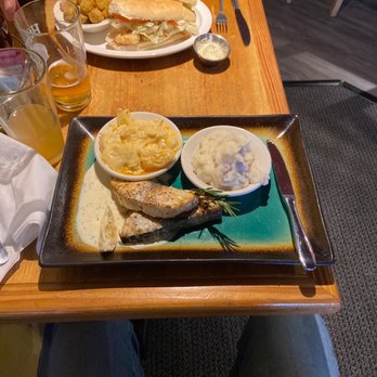 Cajun Yard Dog - Wahoo with lemon cream sauce with smashed taters and smothered cabbage.  Yummy! - Cajun/Creole Near Me - Charlotte, North Carolina