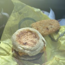 McDonald's - Sausage egg and cheese McMuffin with hash browns