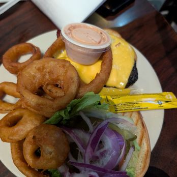 Buffalo Phil's - Farmers burger and side of battered onion rings.. yum - Burgers Near Me - Tuscaloosa, Alabama