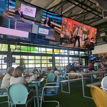 Backyard - Gilbert - Great open atmosphere with large TVs - Cocktail Bars Near Me - Gilbert, Arizona