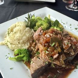 Country French Pot-Au-Feu in the foreground - Slow-Roasted Pork Osso Bucco in the background