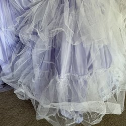 Kilbane's Cleaners & Tuxedo Rental - My nieces quince dress that I paid $207 to get steamed. It looked just like when I took it in. Only top two layers were descent.