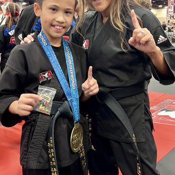 Pride Martial Arts - Nathan with owner, coach and mentor, Master Lizbeth Ahn. - Taekwondo Near Me - Chula Vista, California Pride Martial Arts - Nathan with owner, coach and mentor, Master Lizbeth Ahn. - Taekwondo Near Me - Chula Vista, California