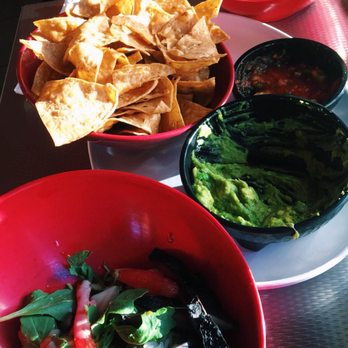 Taco Dive Bar - portobella, arugula, and tomotaoes over sticky jasmine rice. Chips guacamole and salsa. - Mexican Near Me - Peekskill, New York