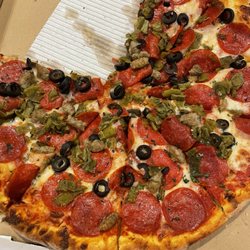 Placitas Pizza - Pepperoni, sausage, olives and green chile. Tasty!