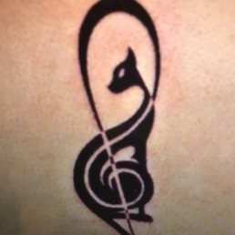 This is what the tat was supposed to look like. Worst work I've seen in decades This is what the tat was supposed to look like. Worst work I've seen in decades