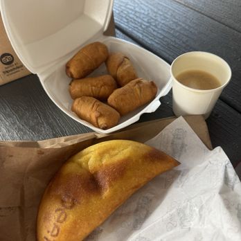 Susana's Cafe - This was $27. Guava & Tequeños with Guava and Cheese (5 units), Empanda de Carne, Cortado w/Oat Milk. - Cafes Near Me - Kissimmee, Florida Susana's Cafe - This was $27. Guava & Tequeños with Guava and Cheese (5 units), Empanda de Carne, Cortado w/Oat Milk. - Cafes Near Me - Kissimmee, Florida