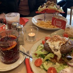 Café Extrablatt - Breadless kartoffelburger and glühwein (front), fajita pita and boozy hot chocolate (back)